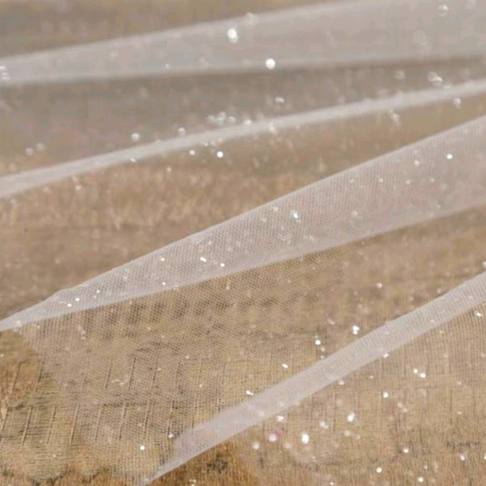 Glitter sparkle ivory tulle fabric
